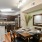 Large well lit dining area with wood floors